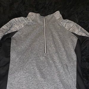 Black and gray exercise sweater